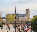 Paris / France - April 04 2019: Square in front of Hotel de Ville, the MunicipalityÃÂ of Paris, full of resting people at sunset.